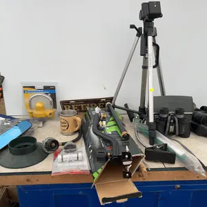 2 pair of binoculars, tripod, misc propane fittings, trailer coupler lock etc