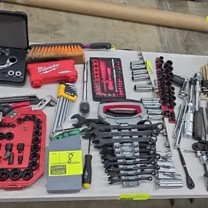 Assorted mechanics hand tools. Includes Husky combination wrenches with organizer rack, Blackhawk serpentine belt tool set with case, pass-through soc