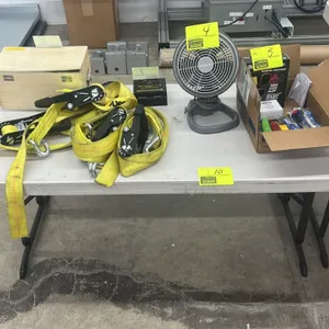 Lifetime folding table. Features adjustable-height design and polyethylene top. 4'L. Mounted on folding metal legs. Contents not included.