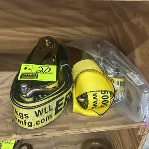 Erickson ratchet tie-down straps. Features yellow webbing, steel ratchet mechanisms, and metal hooks. Rated for 5,000 lbs (2,268 kg) capacity.