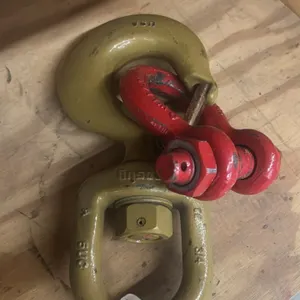 Crosby swivel lifting hook and alloy bolt-type anchor shackle. Features swivel eye hook with spring latch and red bolt-type anchor shackle with nut.