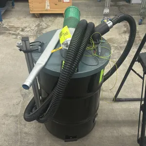 HafcoVac pneumatic industrial drum vacuum. Features compressed air operation with silencer exhaust, vacuum hose, metal nozzle attachments, and static 