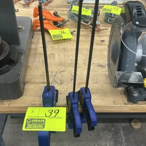 Irwin QUICK-GRIP one-handed bar clamps. Features quick-release trigger mechanism, durable resin construction, and steel bar.