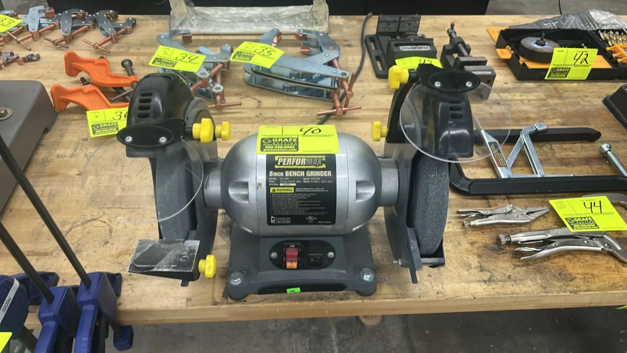 2015 Performax 241-1448 8" bench grinder. Features dual grinding wheels, adjustable eye shields, and tool rests. Speed: 3,560 RPM. 5/8" arbor. Electri