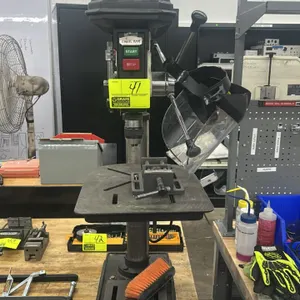 Jet JDP-15M benchtop drill press. Features clear chuck guard, mounted Palmgren drill press vise, slotted adjustable worktable with crank elevation, an