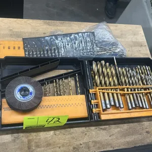 Assorted drill bit set with index storage case. Includes various sizes of twist drill bits, additional micro/wire gauge drill bits in sleeve, and a Me