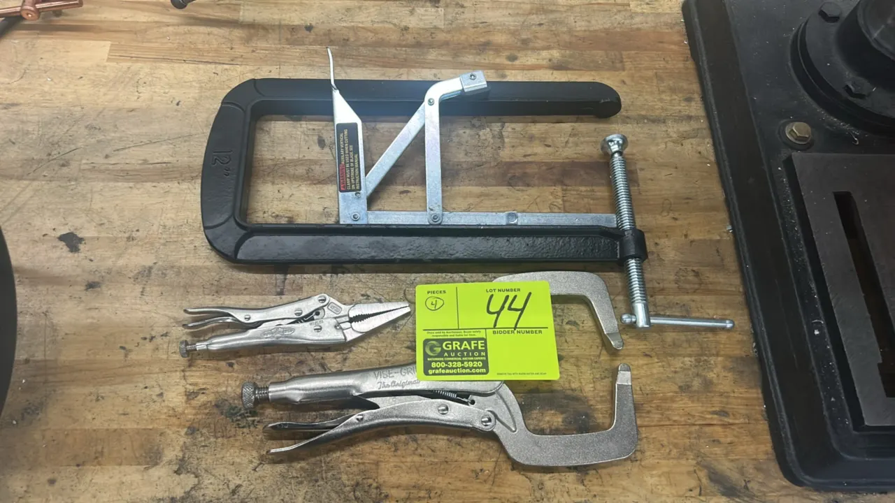 Assorted locking pliers and C-clamps. Includes a 12" deep-reach C-clamp with auxiliary vertical clamp attachment, Vise-Grip locking C-clamp pliers, Vi