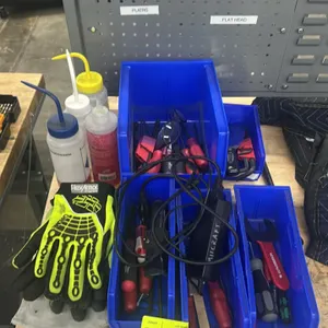 Assorted hand tools and shop accessories. Includes HexArmor work gloves, various screwdrivers, hex key sets, Hyde scraper, squeeze wash bottles, safet