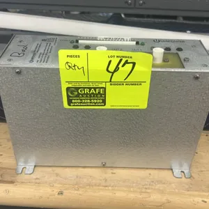 Unipower 229-00053-10000 AC power supply with assorted metal pieces and panel components. S/N: 3121-DG130. Electrical: +24VDC, 2A input; dual 8-15kV p