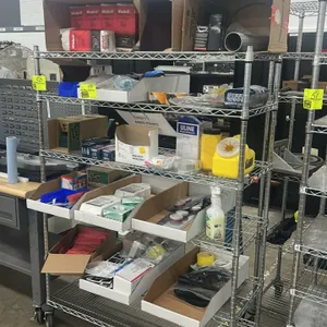 Multi-tier portable wire shelving rack. Features 5 wire shelves with a chrome finish. 48" x 20". Mounted on swivel casters. Contents not included.