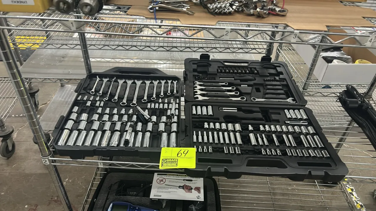 Portable mechanics tool sets. Includes an assortment of chrome standard and deep sockets, combination wrenches, extension bars, and driver bits from m