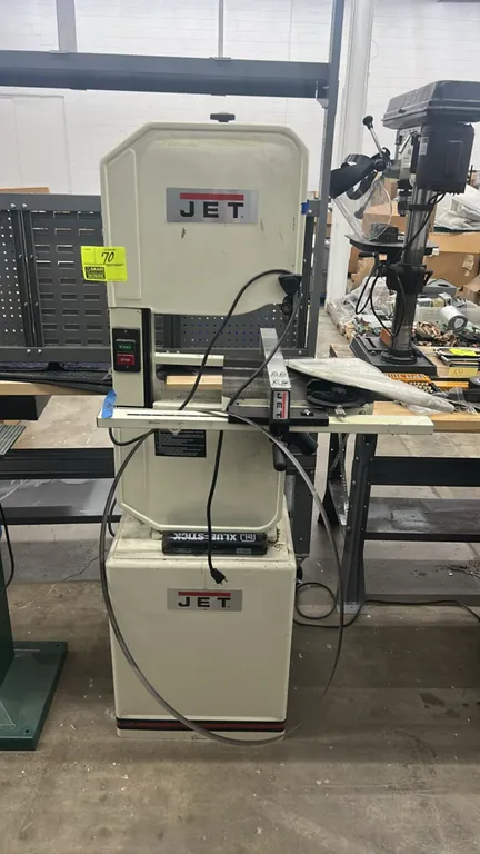 JET J-8201K 14" wood/metal vertical band saw. Features rip fence, miter gauge, and 7 speeds with 39-278 SFPM range. S/N: 14050526. Electrical: 1 HP mo