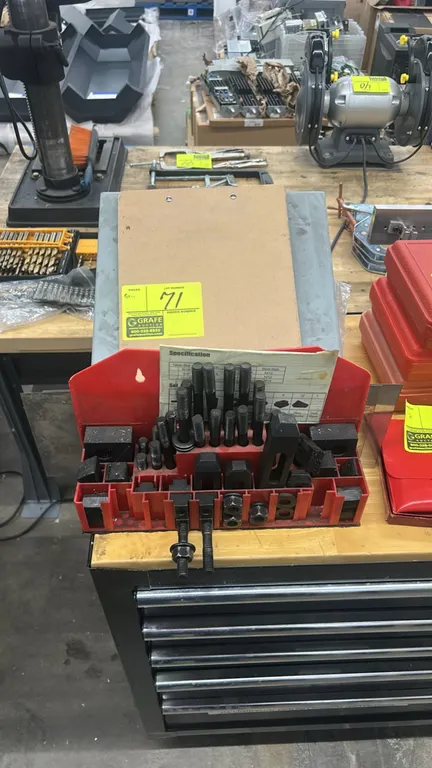 58-piece machinist T-slot clamping kit. Includes step blocks, clamping studs, coupling nuts, flange nuts, T-nuts, and step clamps in a molded holder.