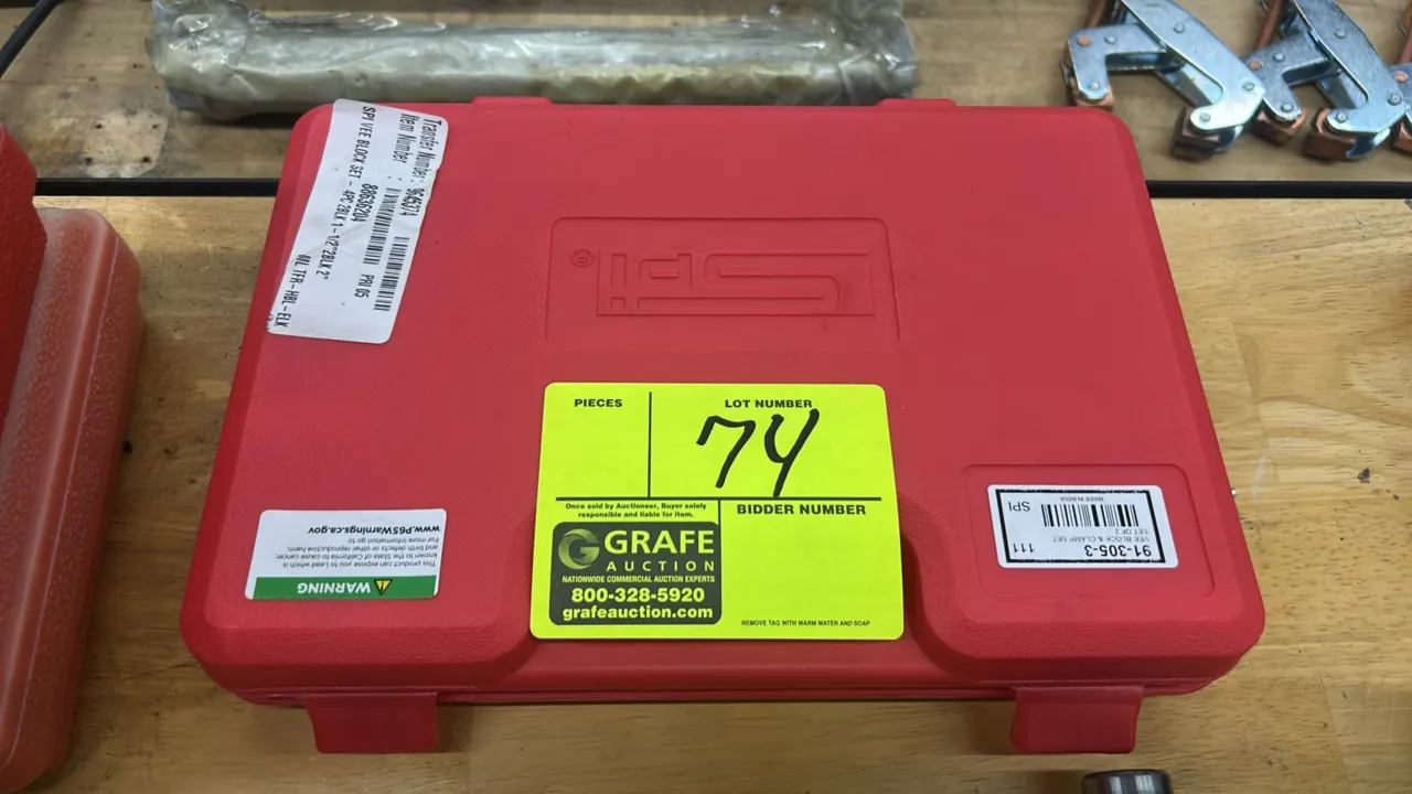 SPI 91-305-3 V-block and clamp set. Includes (4) steel V-blocks (two 1-1/2" and two 2") and (4) clamps. Housed in a fitted red molded plastic case.