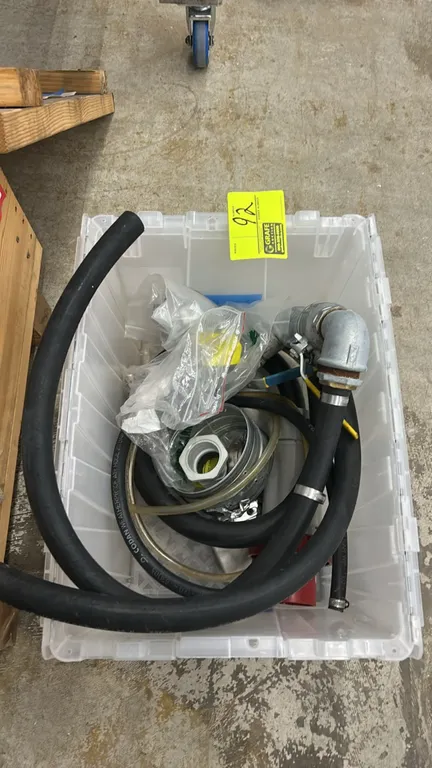 Assorted hoses and metal fittings lot. Includes Codan air hose, galvanized pipe fittings with ball valve, clear tubing, hose clamps, and various hardw