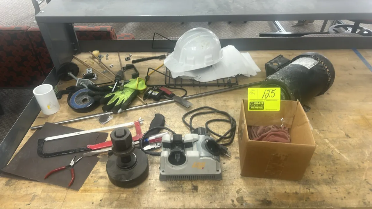 Package lot of workshop equipment and tools. Includes Drill Doctor 750X drill bit sharpener, WEG electric motor, box of shop rags, hard hat, hand tool