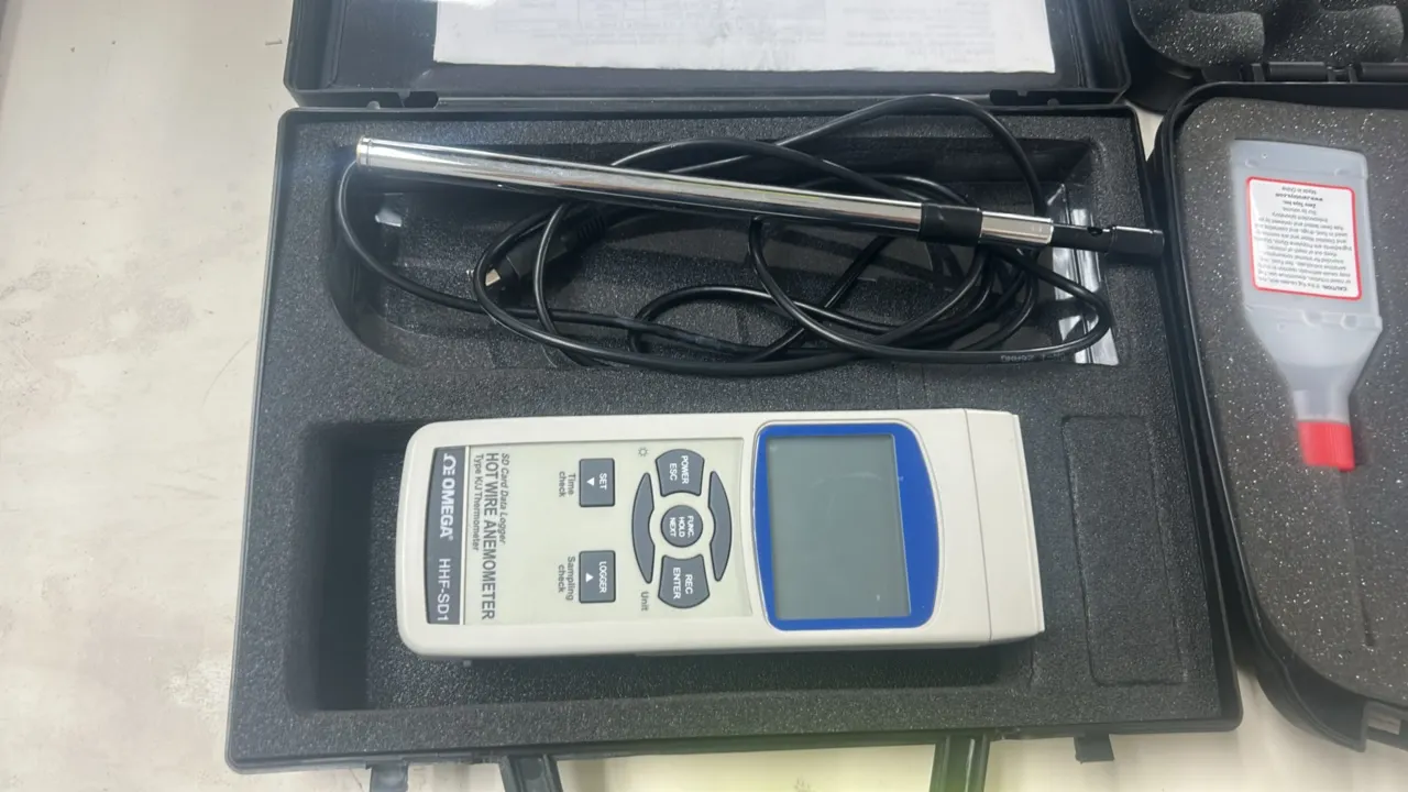Omega Engineering HHF-SD1 hot wire anemometer and Smoke Pencil ONE air leak detector field kit. Omega unit features SD card data logging, Type K/J the