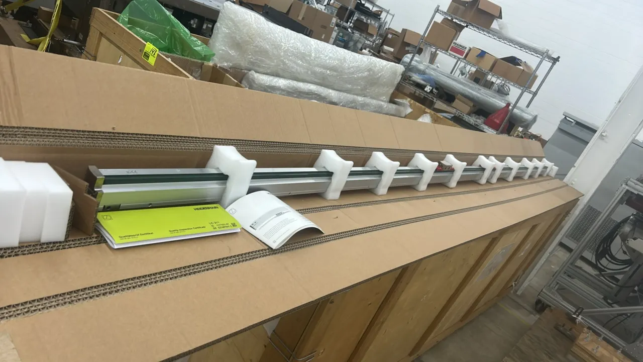 Heidenhain LC 211 linear encoders. Features extruded aluminum housing and absolute position measurement technology. Includes mounting instructions and