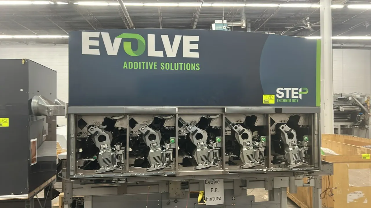 Kodak NexPress S3000 digital production color press assembly. Features Evolve Additive Solutions STEP technology branding, internal electrophotographi