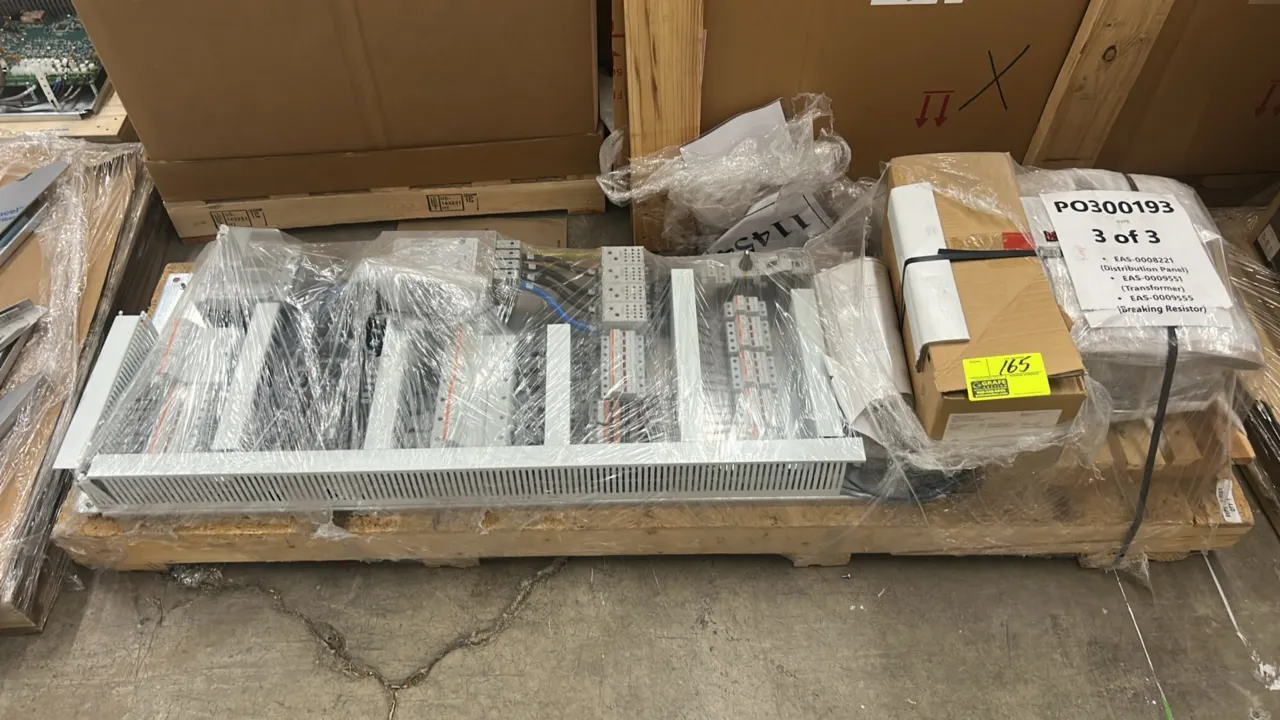 Industrial electrical distribution panel assembly lot. Includes pre-wired electrical distribution backpanel (EAS-0008221), transformer (EAS-0009551),