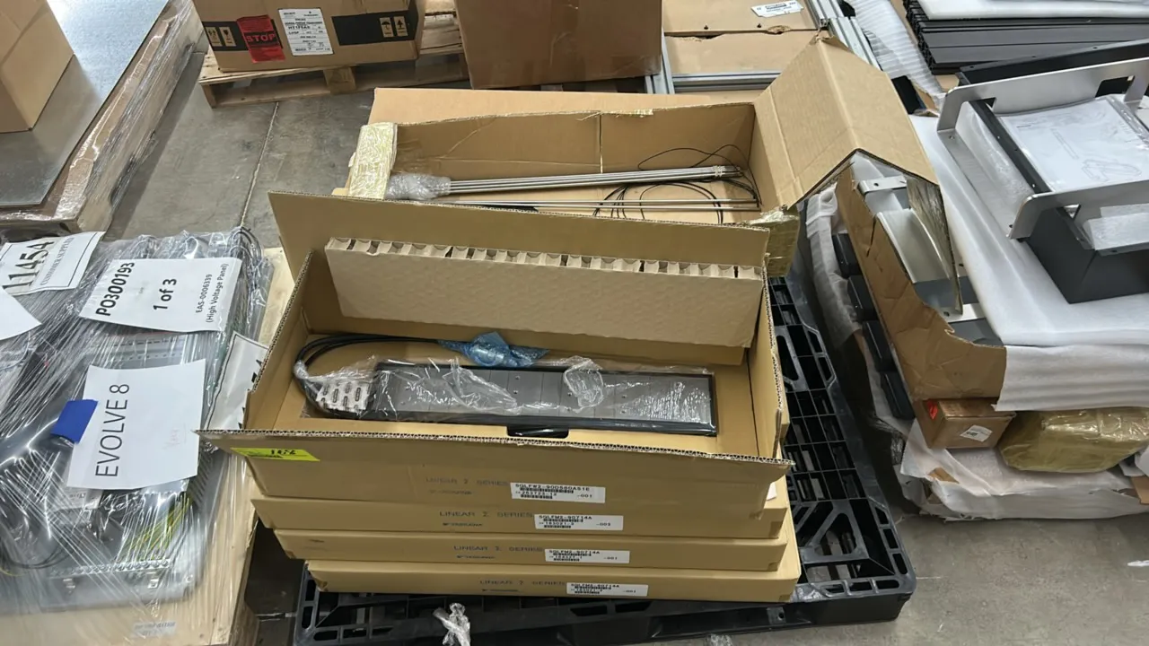 Yaskawa industrial components and parts lot. Includes Yaskawa linear units, replacement rollers, industrial tubular heating elements, and remaining co