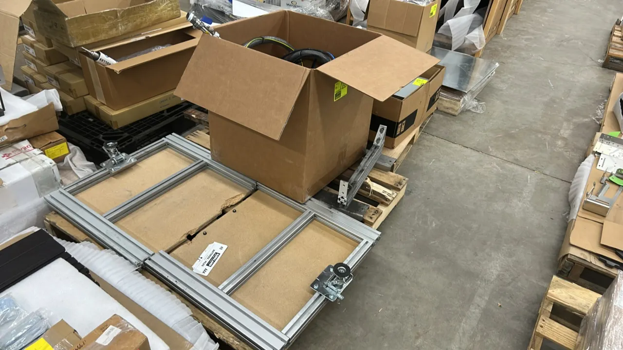 Pallet lot of maintenance supplies and hardware. Includes stainless steel handle mop with yarn head, coiled gray corrugated vacuum/drain hoses with tr