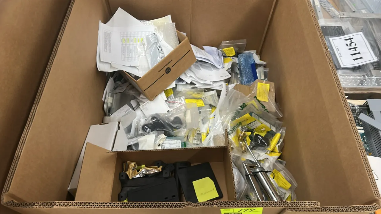 Assorted mechanical components and hardware lot. Includes black poly mechanical components, lever-action grease gun, assorted fittings, hardware, McMa