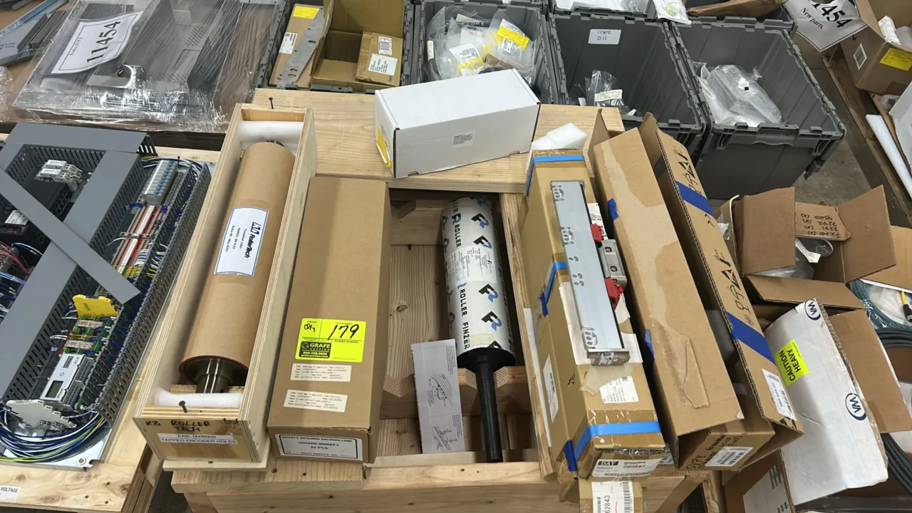 Industrial roller and linear encoder lot. Includes Rollertech transfuse roller (dated May 2023), Finzer Roller rubber/urethane roller, and Heidenhain