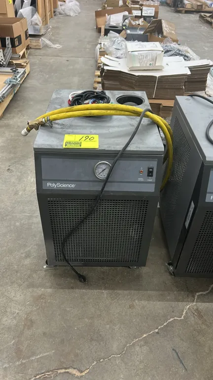 PolyScience 3370 liquid-to-air cooler. Features front analog pressure gauge, power switch, indicator light, and top reservoir access. Includes yellow