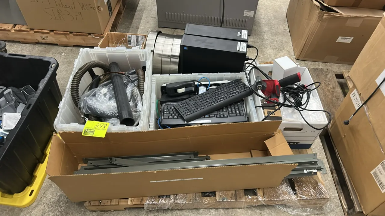 Facility and IT equipment assortment. Includes desktop computer towers, keyboards, assorted cables, flexible utility hoses with attachments, stainless