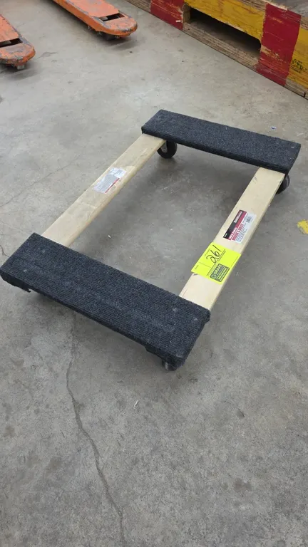 HaulMaster 62398 mover's dolly. Features hardwood frame construction with carpeted ends and 1,000 lb capacity. 30"L x 19"W x 6"H. Mounted on 2-3/4" sw
