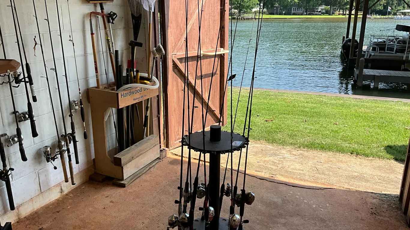 QTY OF (10) FISHING RODS, W/ 24-ROD HOLDER