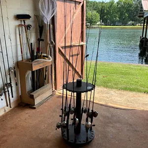 QTY OF (10) FISHING RODS, W/ 24-ROD HOLDER