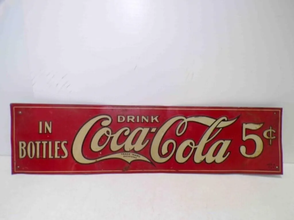 Original 1920s Embossed Metal Coca-Cola in Bottles