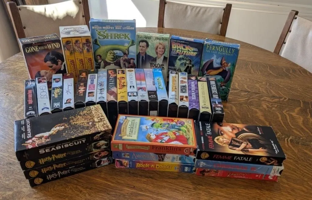Assorted Vintage VHS Tapes. tetles such as Gone