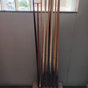 Pool cues and floor stand