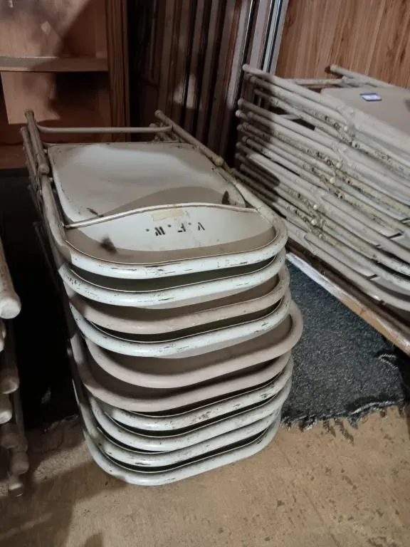 Ten metal folding chairs