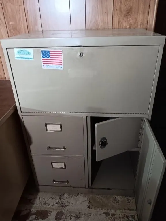Metal filing cabinet with combination lock,