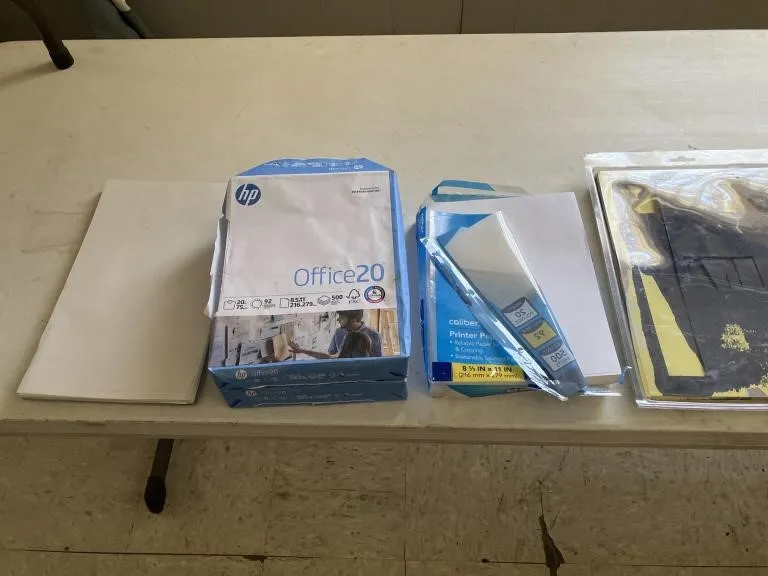 Manila envelopes, printer paper, and letter
