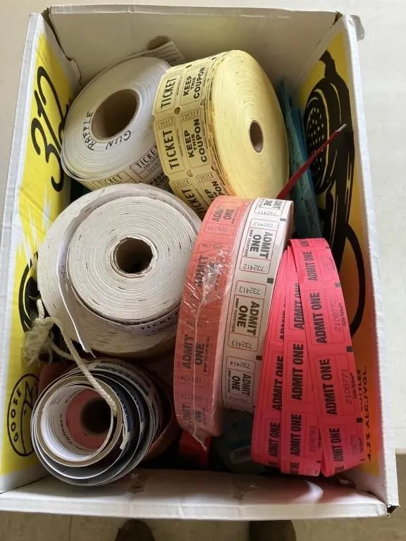 Box of assorted ticket stubs. Various colors and
