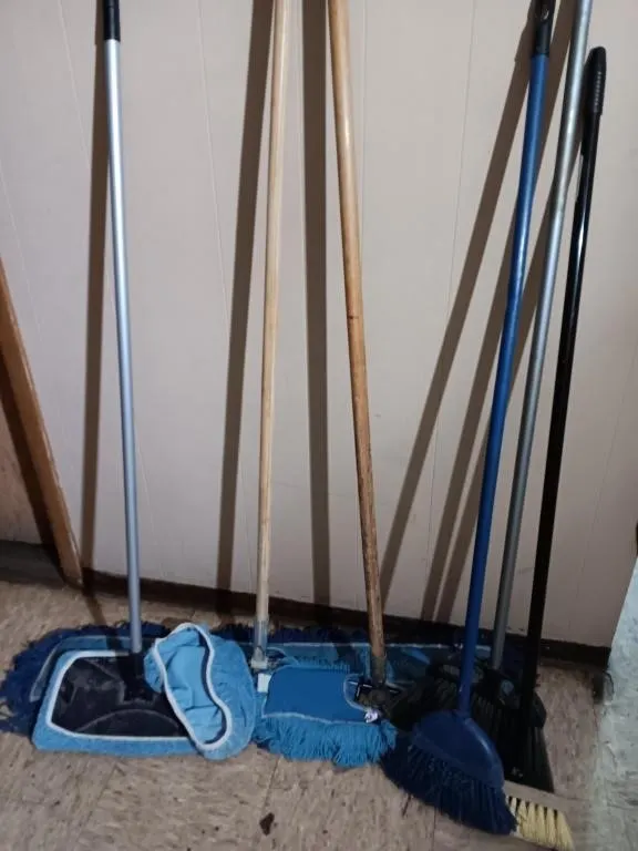 Assortment of brooms