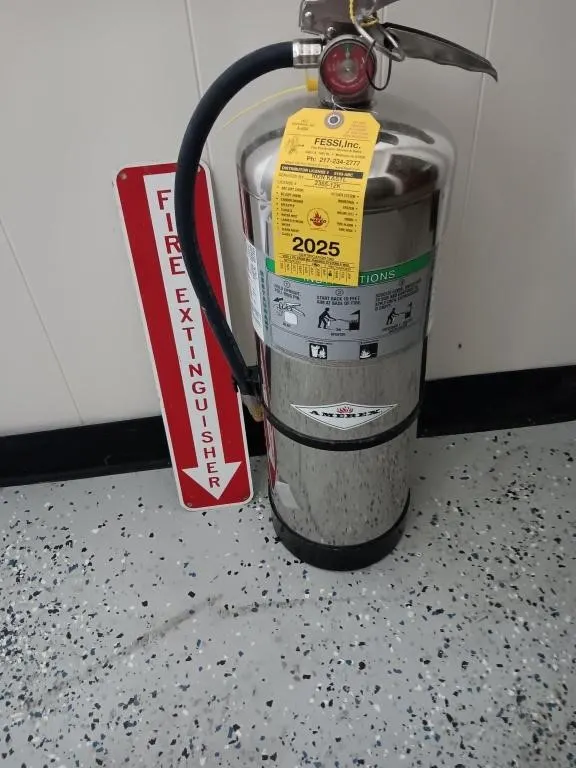 AMEREX fire extinguisher and metal sign