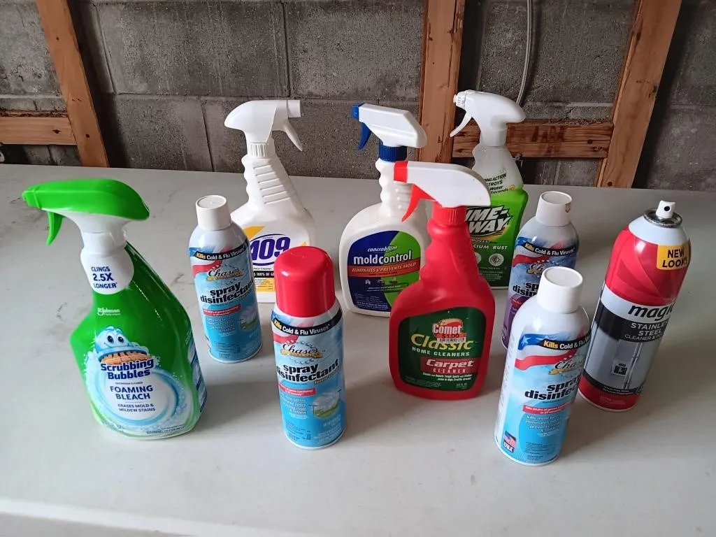 Assorted cleaning supplies and disinfectant