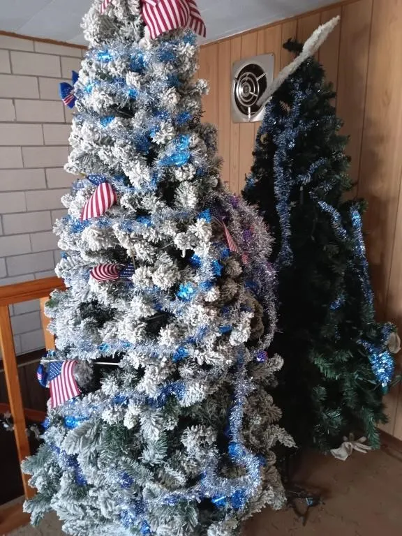 Two artificial Christmas trees