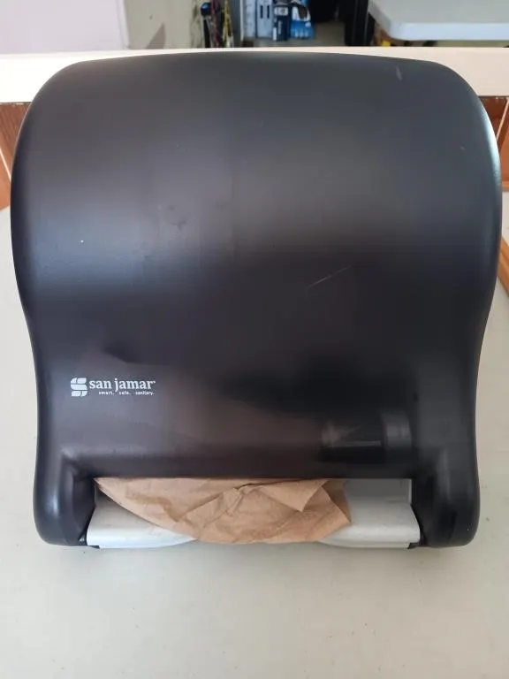 Wall hanging paper towel dispenser
Appears to
