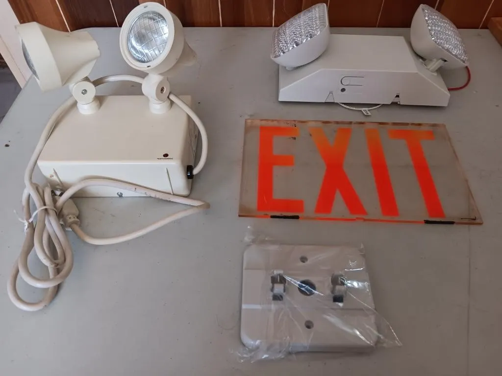 Exit sign and outdoor lighting
May be missing