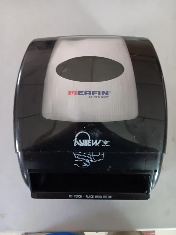 Merfin automatic paper towel dispenser. Used.