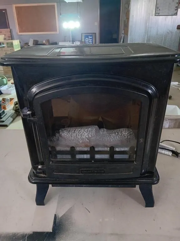 Decor Flame space heater. 21in. x 17.5in. x 10in.