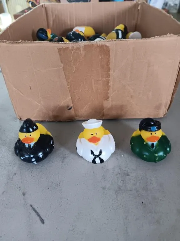 Box of miniature military rubber ducks.