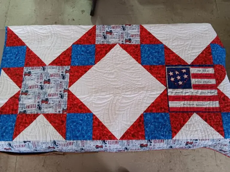 72in. x 57in. Patriotic quilt.